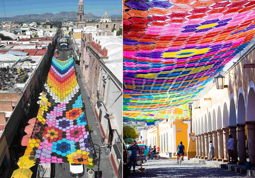 colorful fabric hangs over street