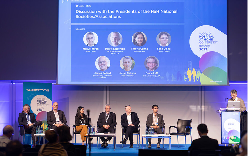 people on stage in panel discussion