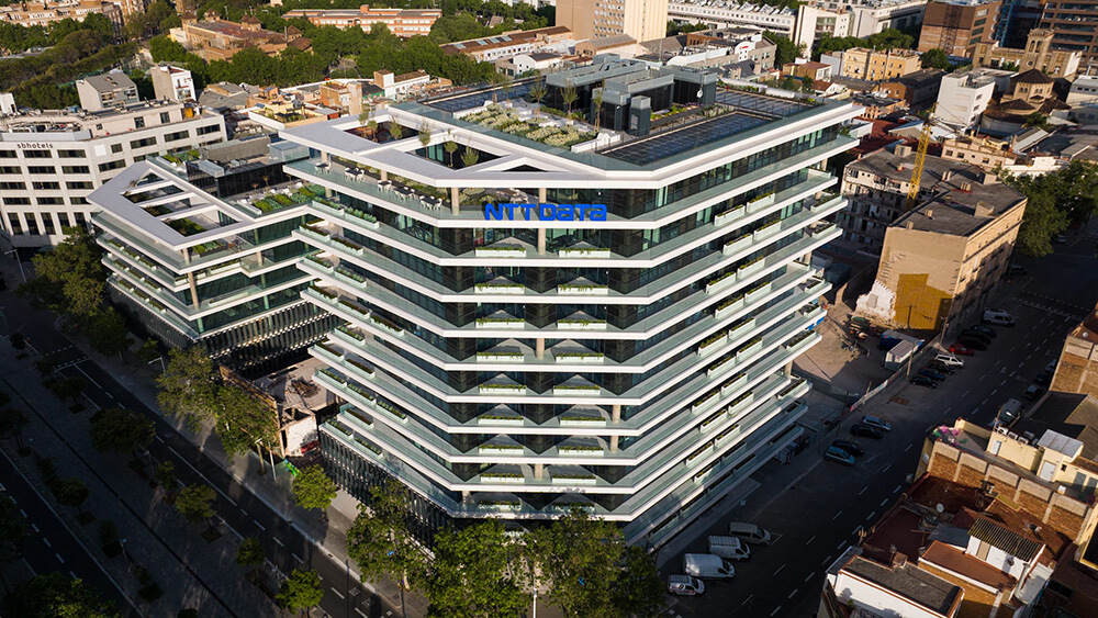 aerial of building that looks like stacked layers