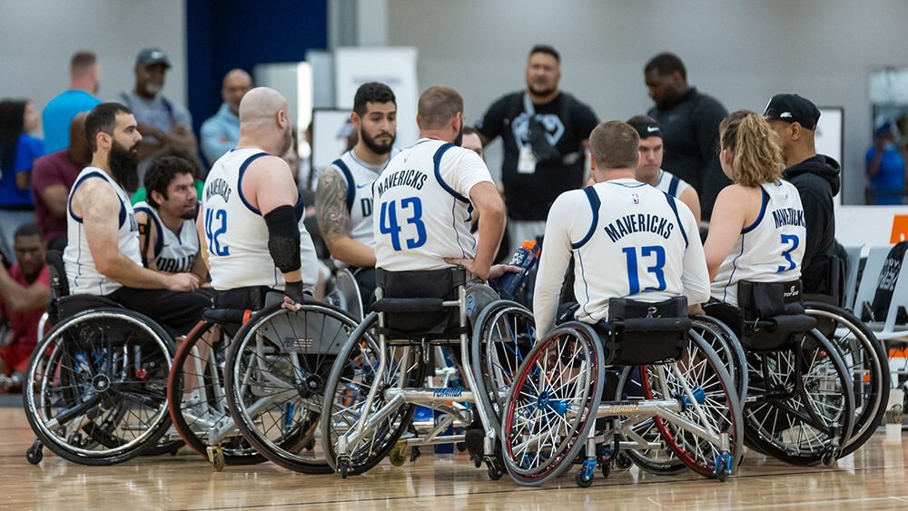 Mavericks team in huddle during game