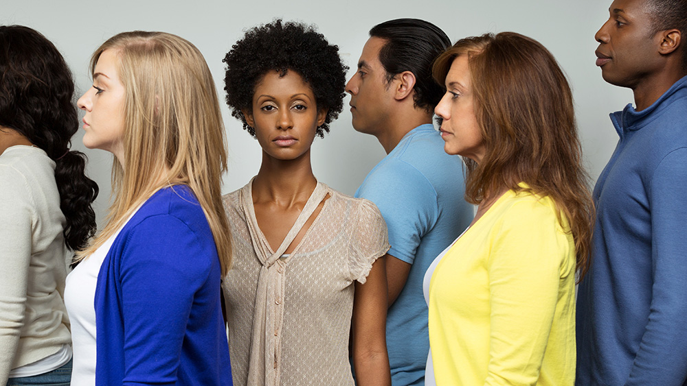 woman looking forward in group looking sideways