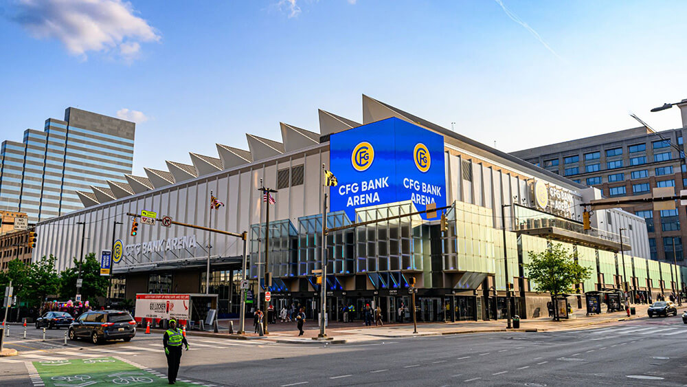 arena exterior with blue banner showing arena name